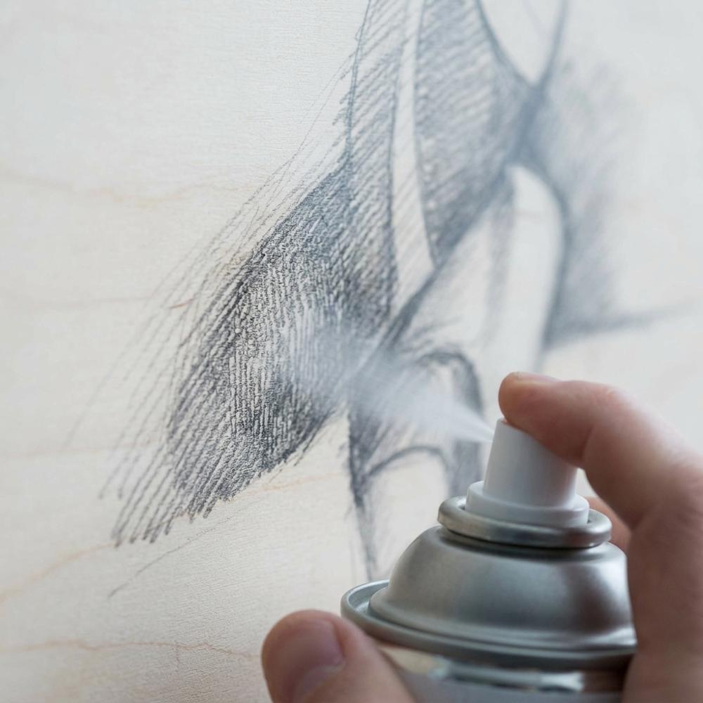 workable fixative spray for protecting pencil and charcoal drawings from smudging