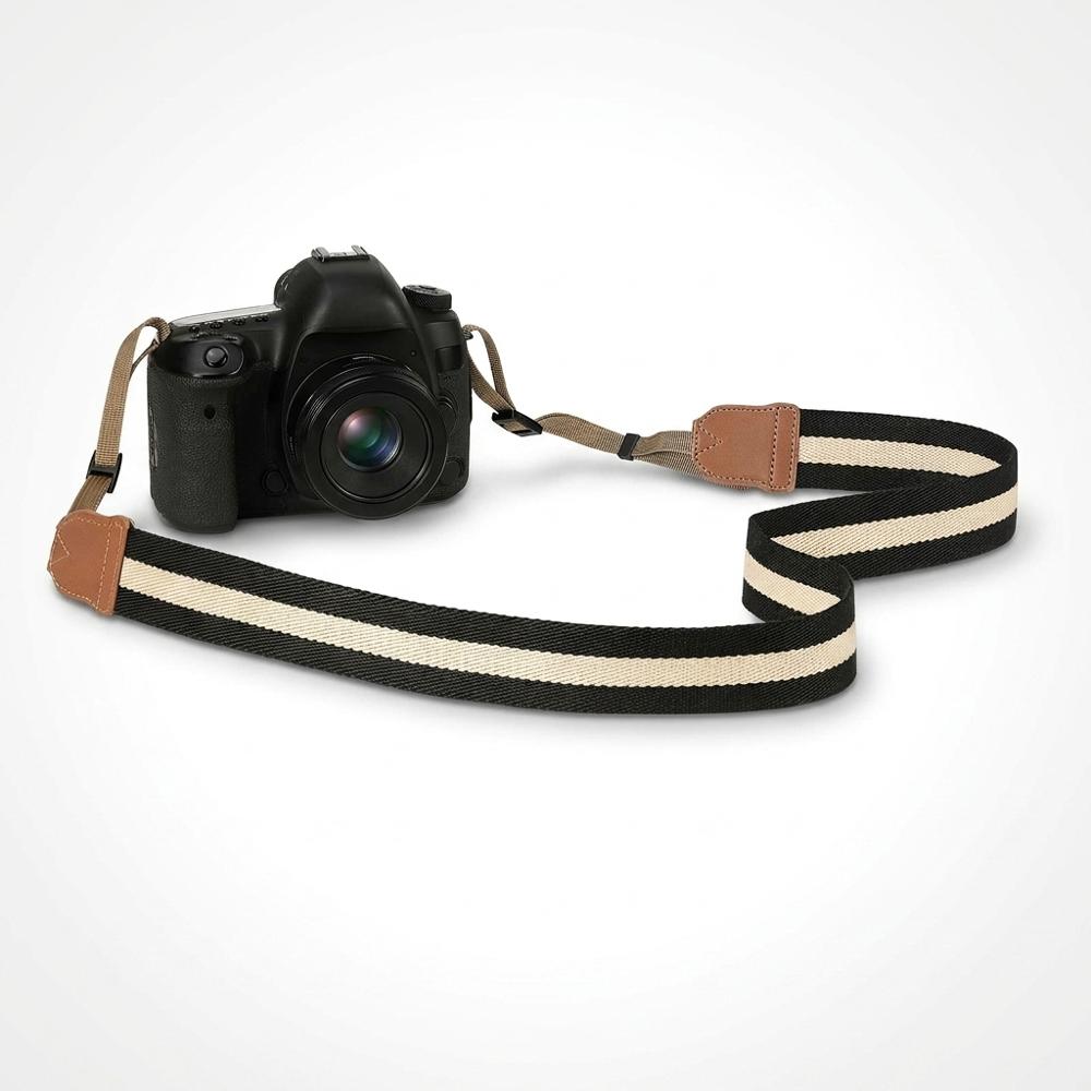 Adjustable woven neck and shoulder strap for compact cameras