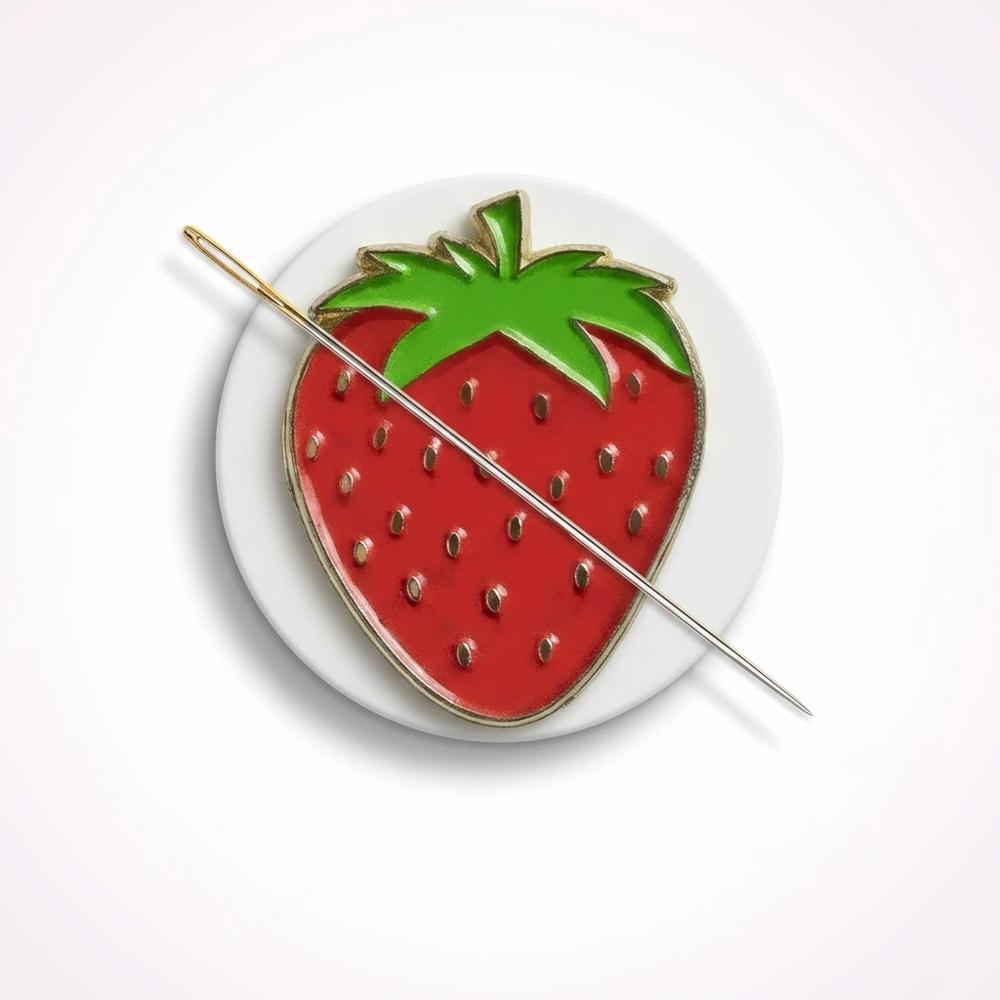 magnetic needle minder to hold cross-stitch needles safely between stitches